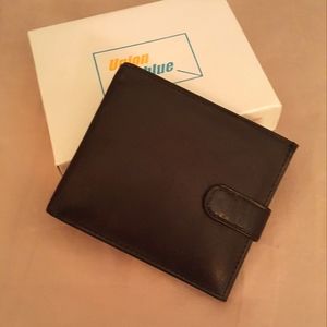 NWOT  genuine leather dark brown wallet.